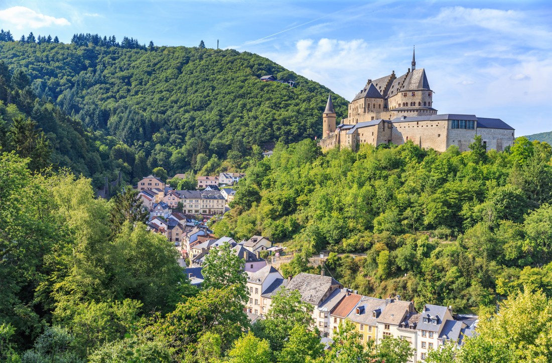 Vianden castle and a small valley in Luxembourg.