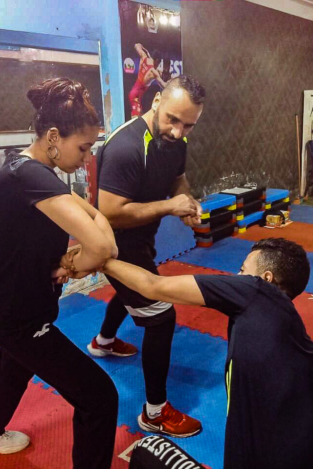 Amir Al Awad teaching a self-defense class.