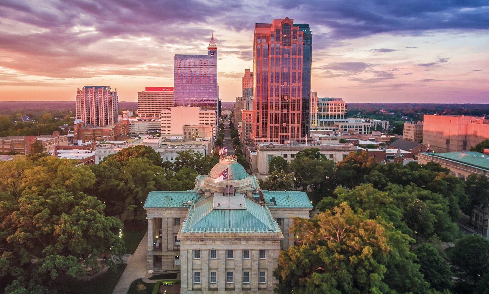 The Raleigh, NC skyline at sunset.