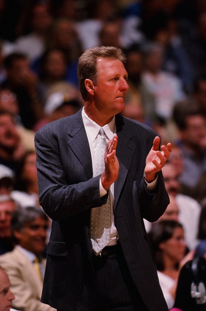 Heach coach Larry Bird of the Indiana Pacers claps in Game Two of the Eastern Conference Finals against the New York Knicks on May 25, 2000 at Conseco Fieldhouse in Indianapolis, Indiana