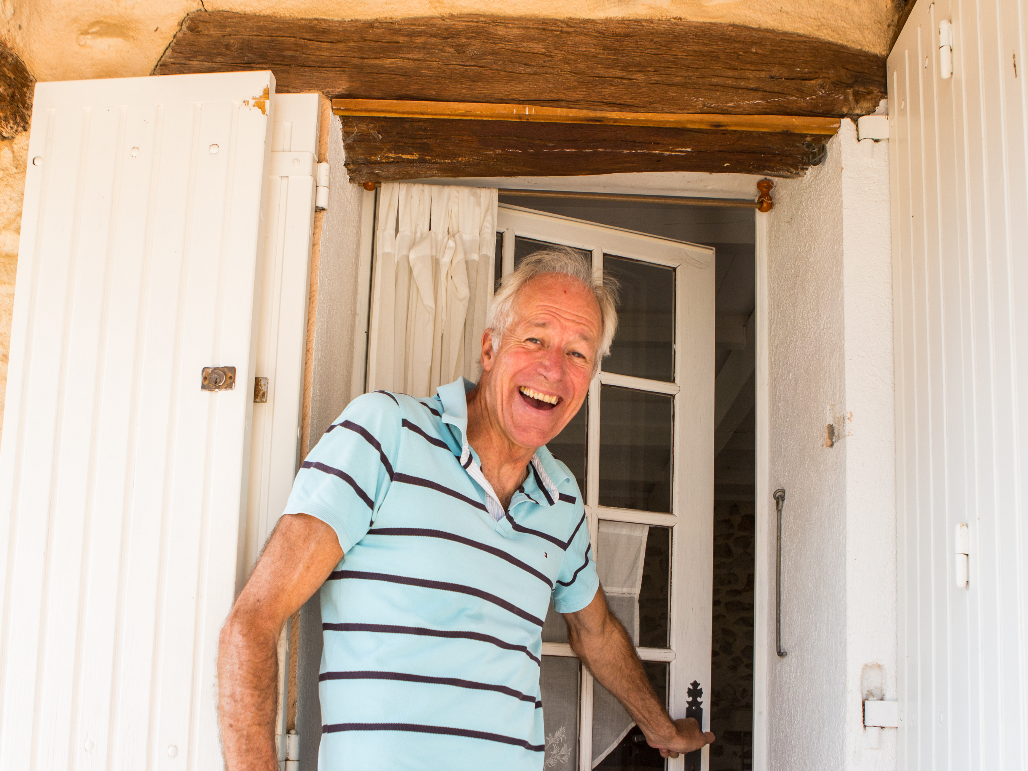 old male host smiling