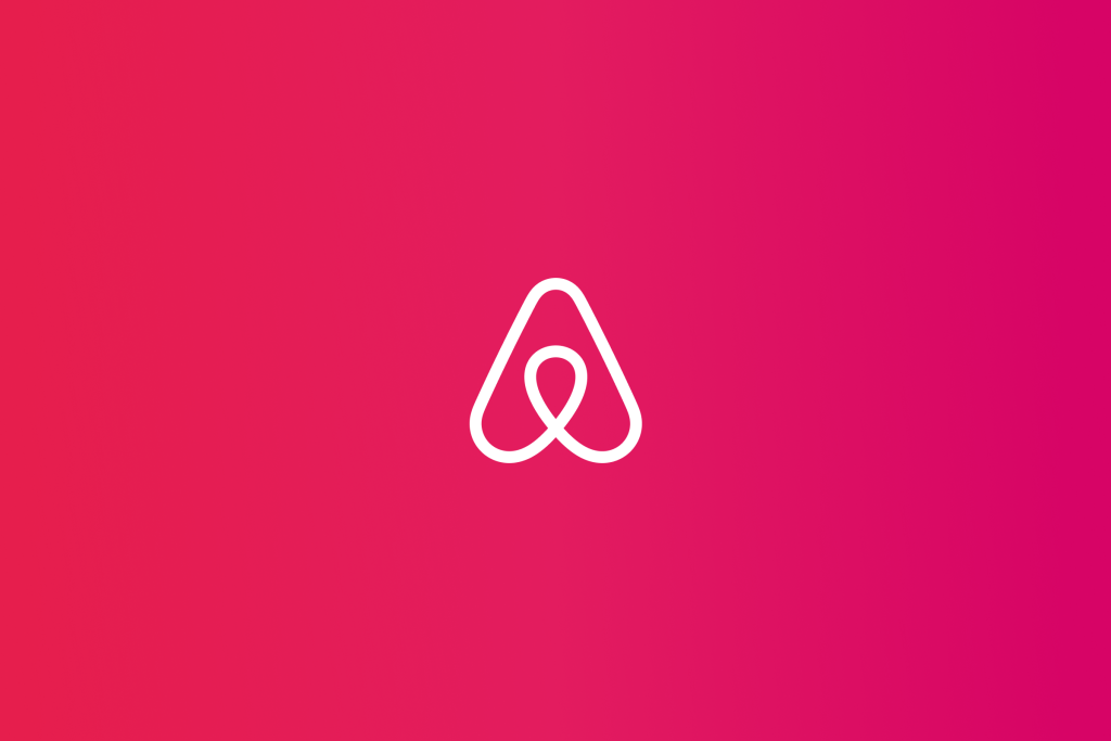 Airbnb belo logo over pink gradient