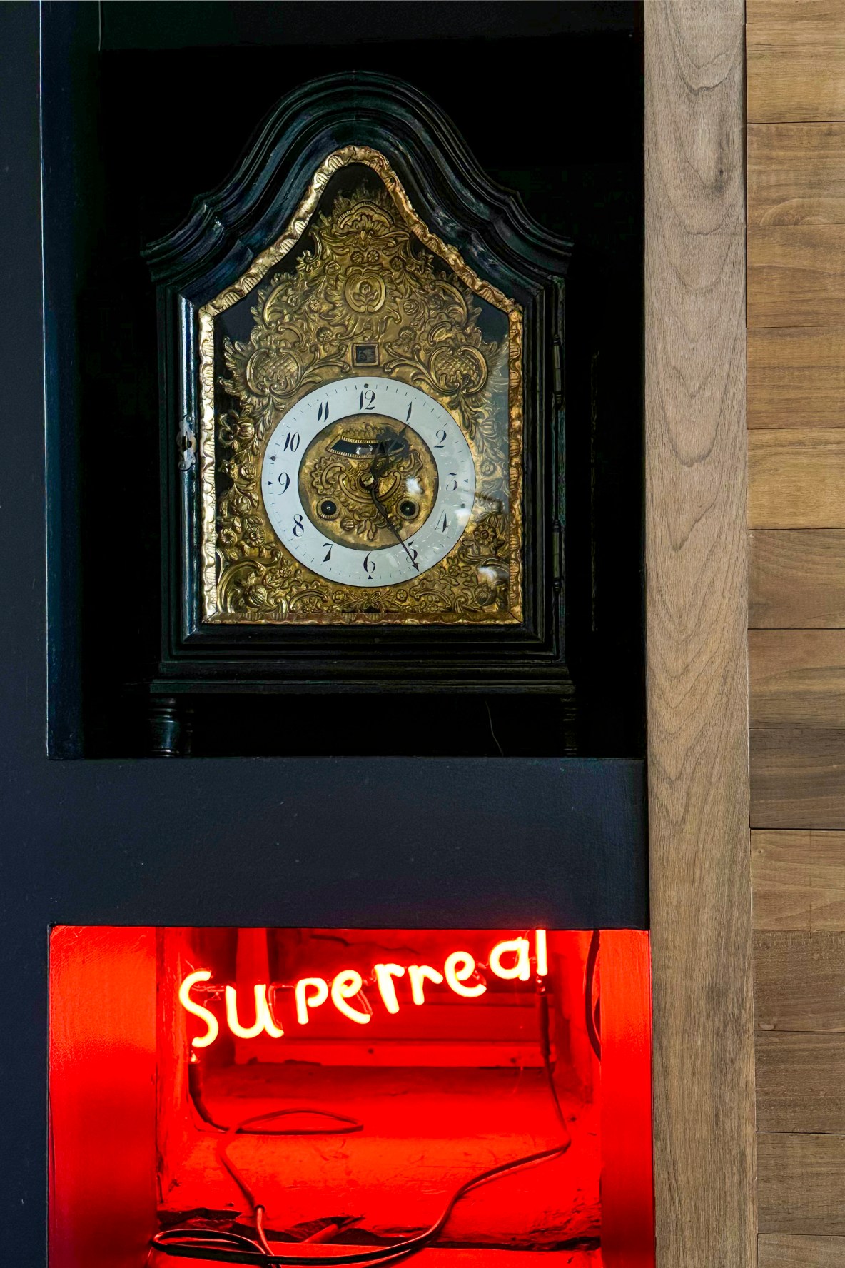 Eclectic, black and gold grandfather clock with a modern twist.