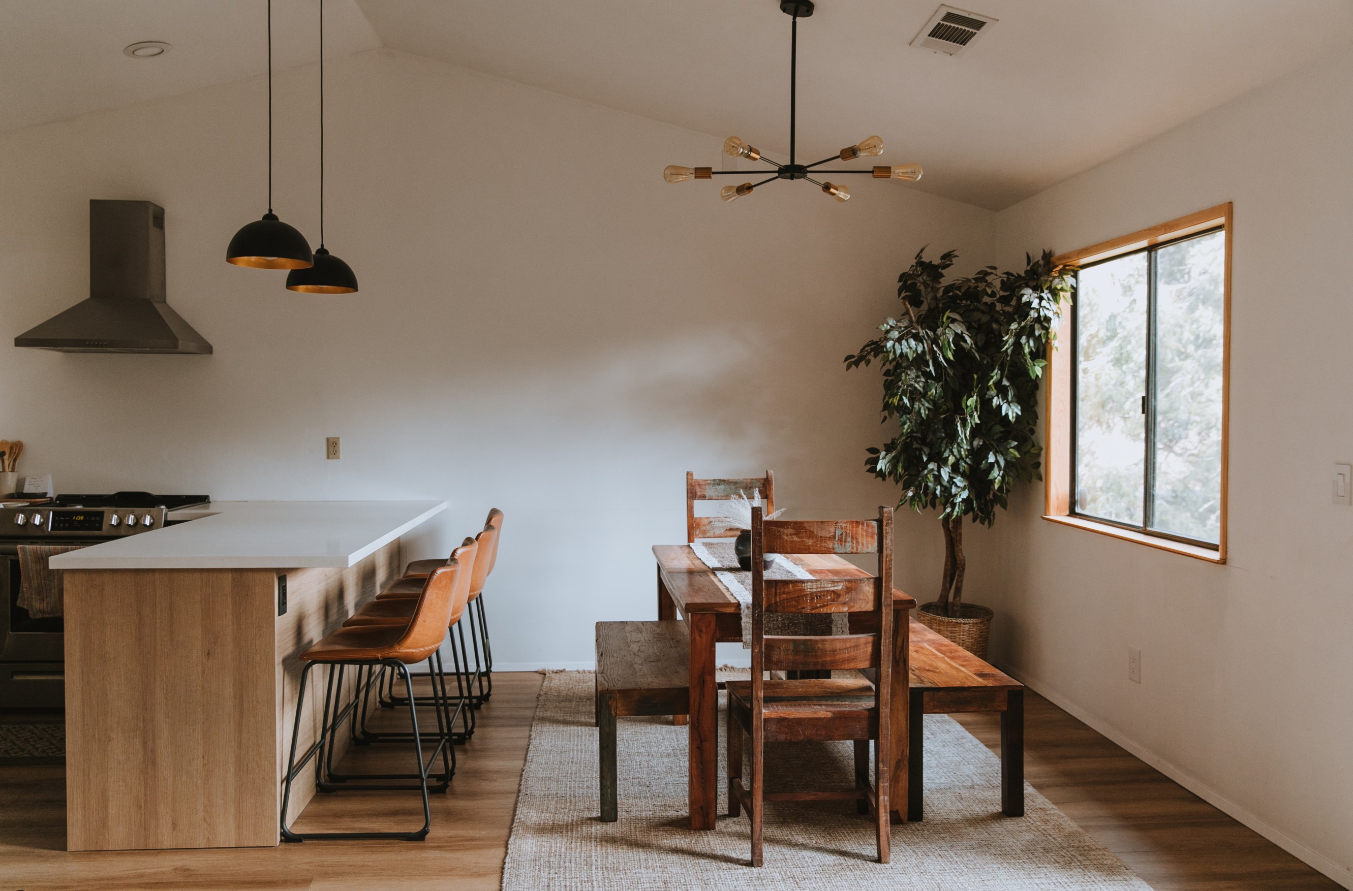 A dining table and kitchen counter in Michelle's new listing.