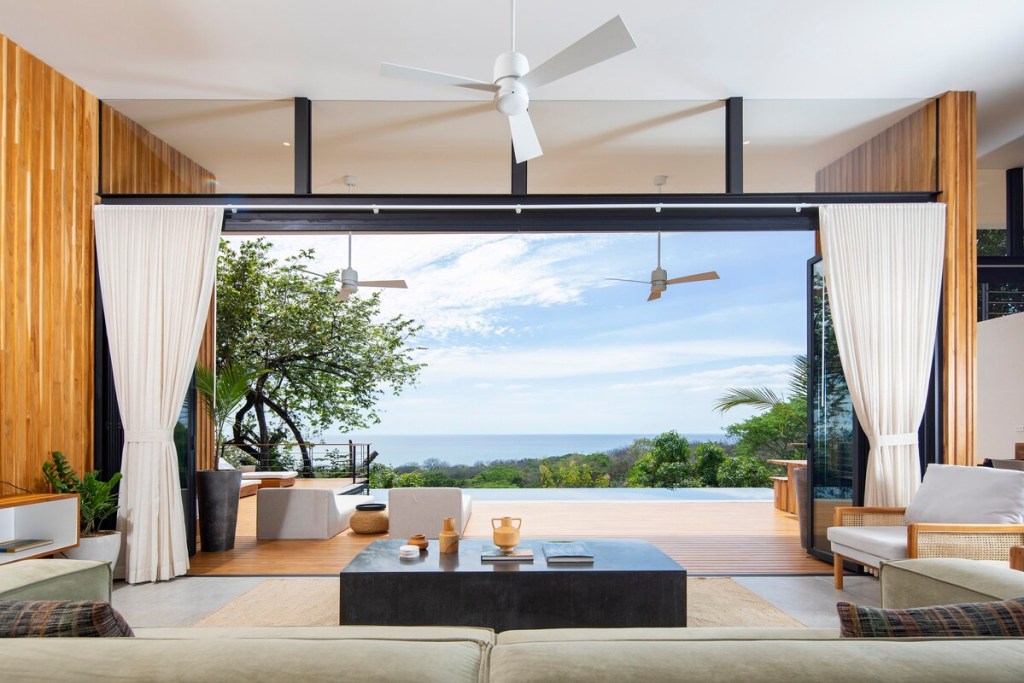 A contemporary living room with an ocean view