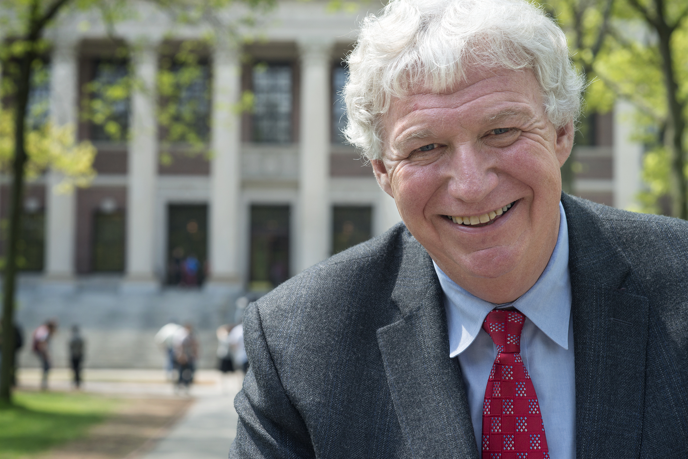 Rich Serino smiling wearing a suit