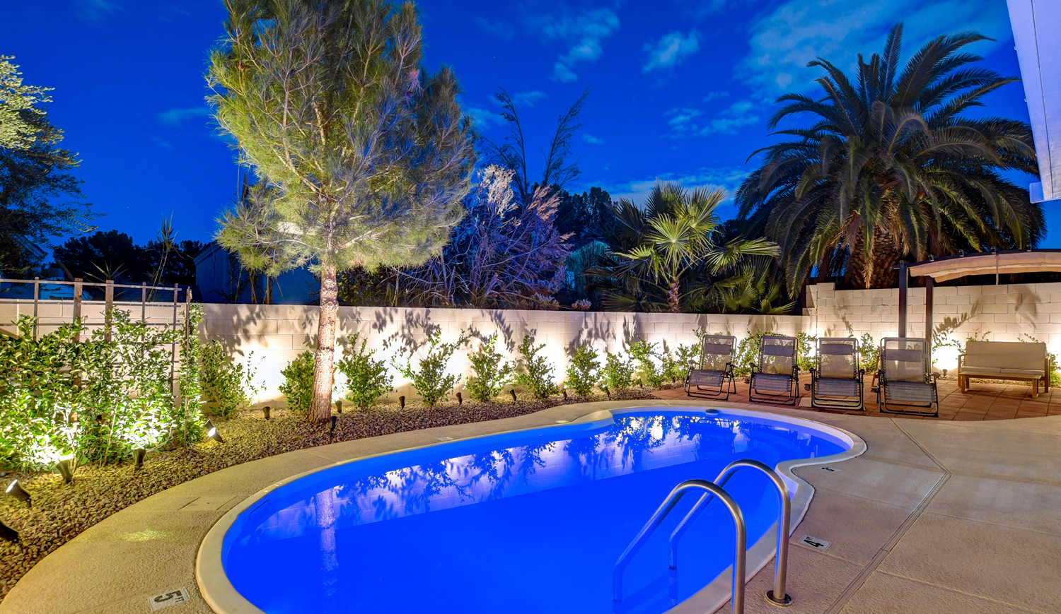 Pool and backyard patio at Private Las Vegas Home w/ Pool & Spa