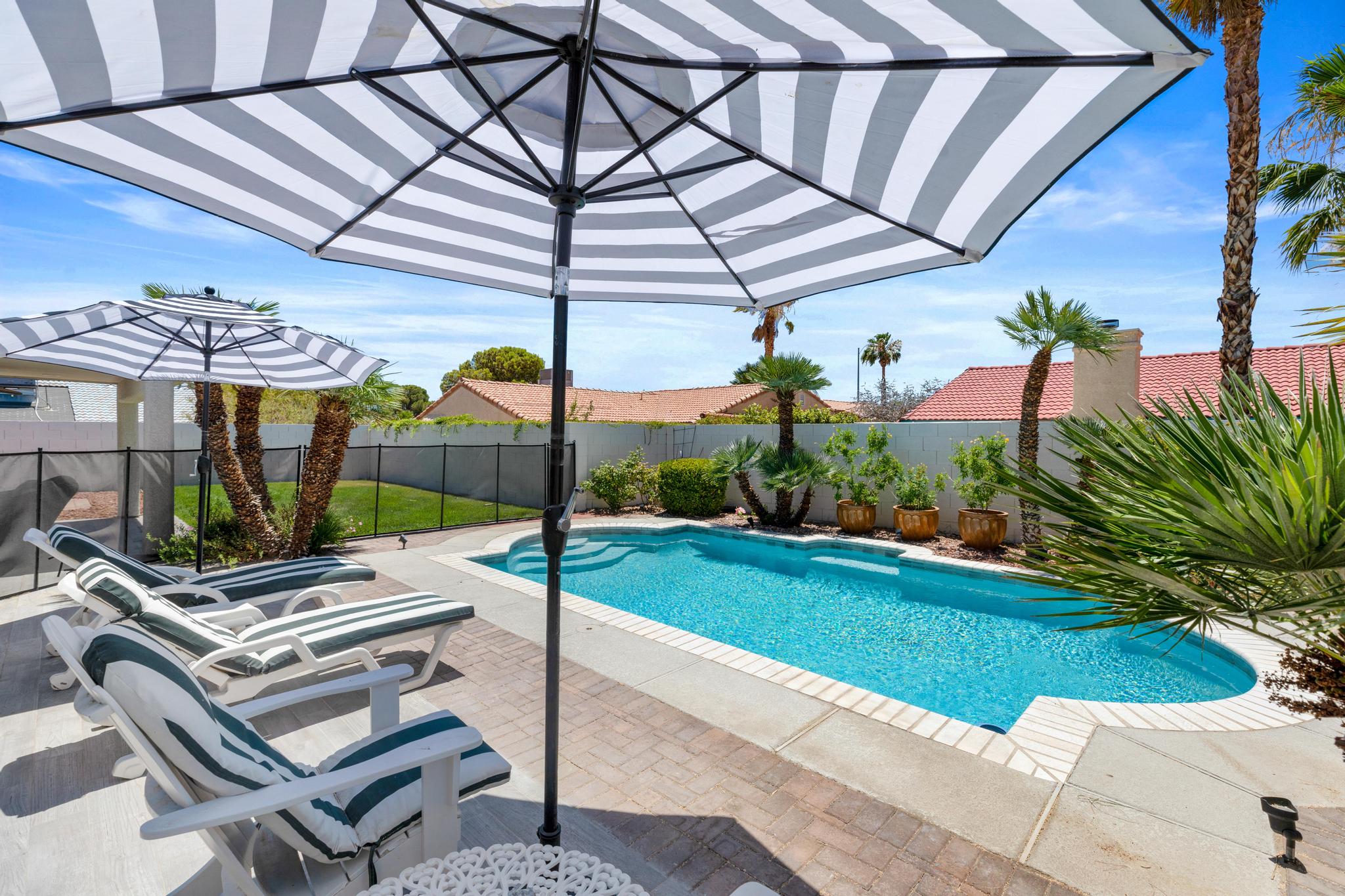Pool and backyard at Spacious Modern Home with Pool