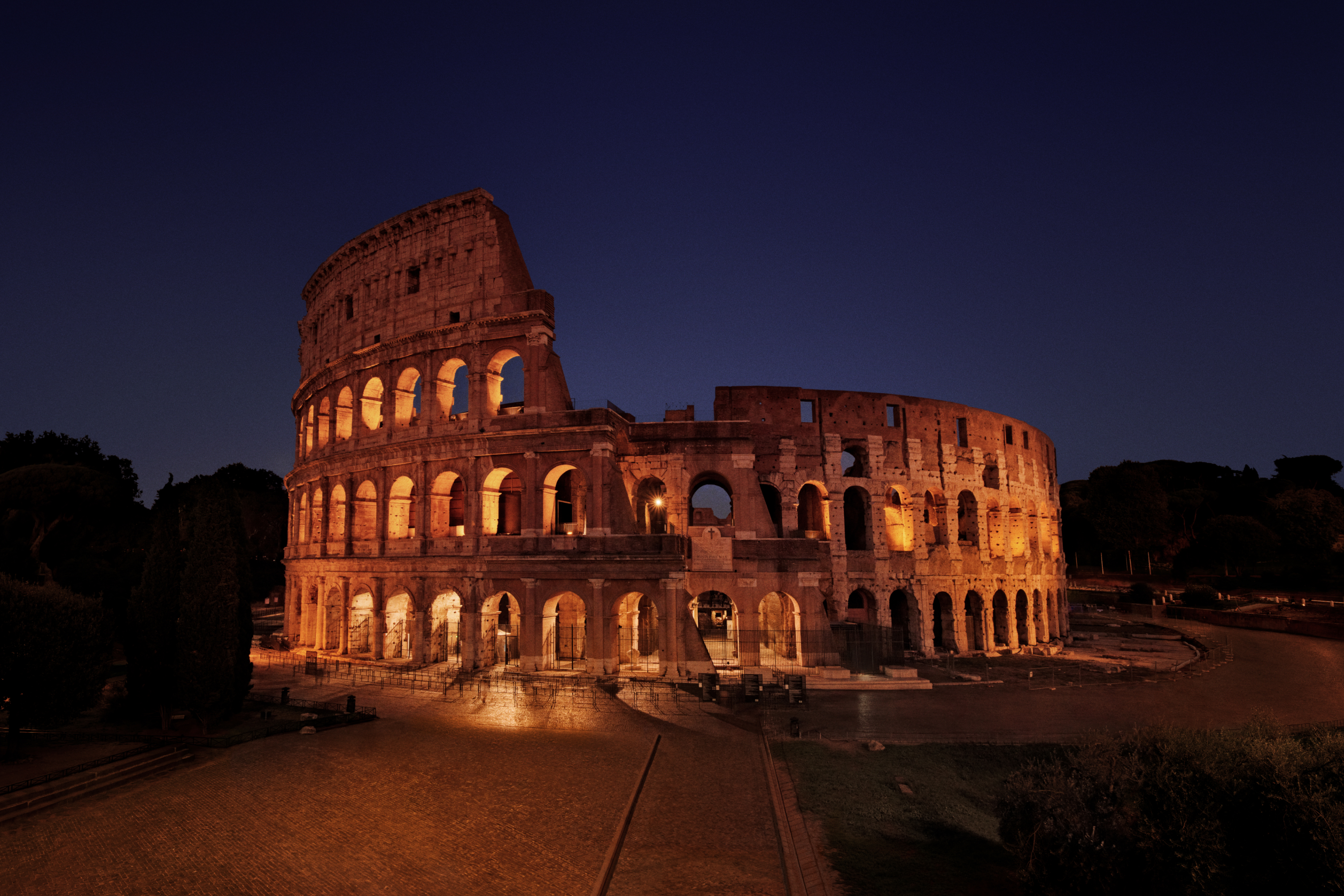 Exterior of colosseum with blue sky