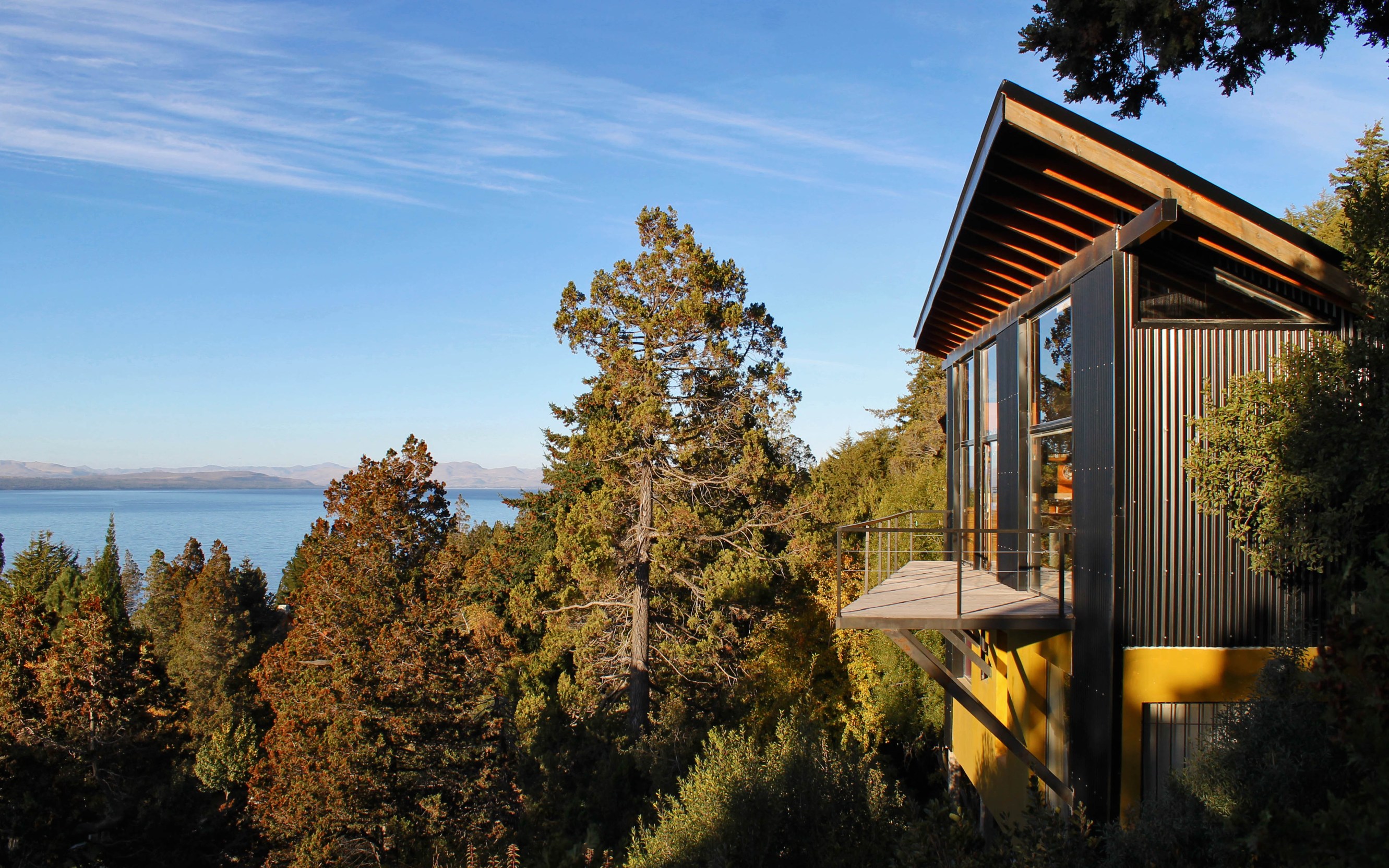 Exterior of house with lake and tree view