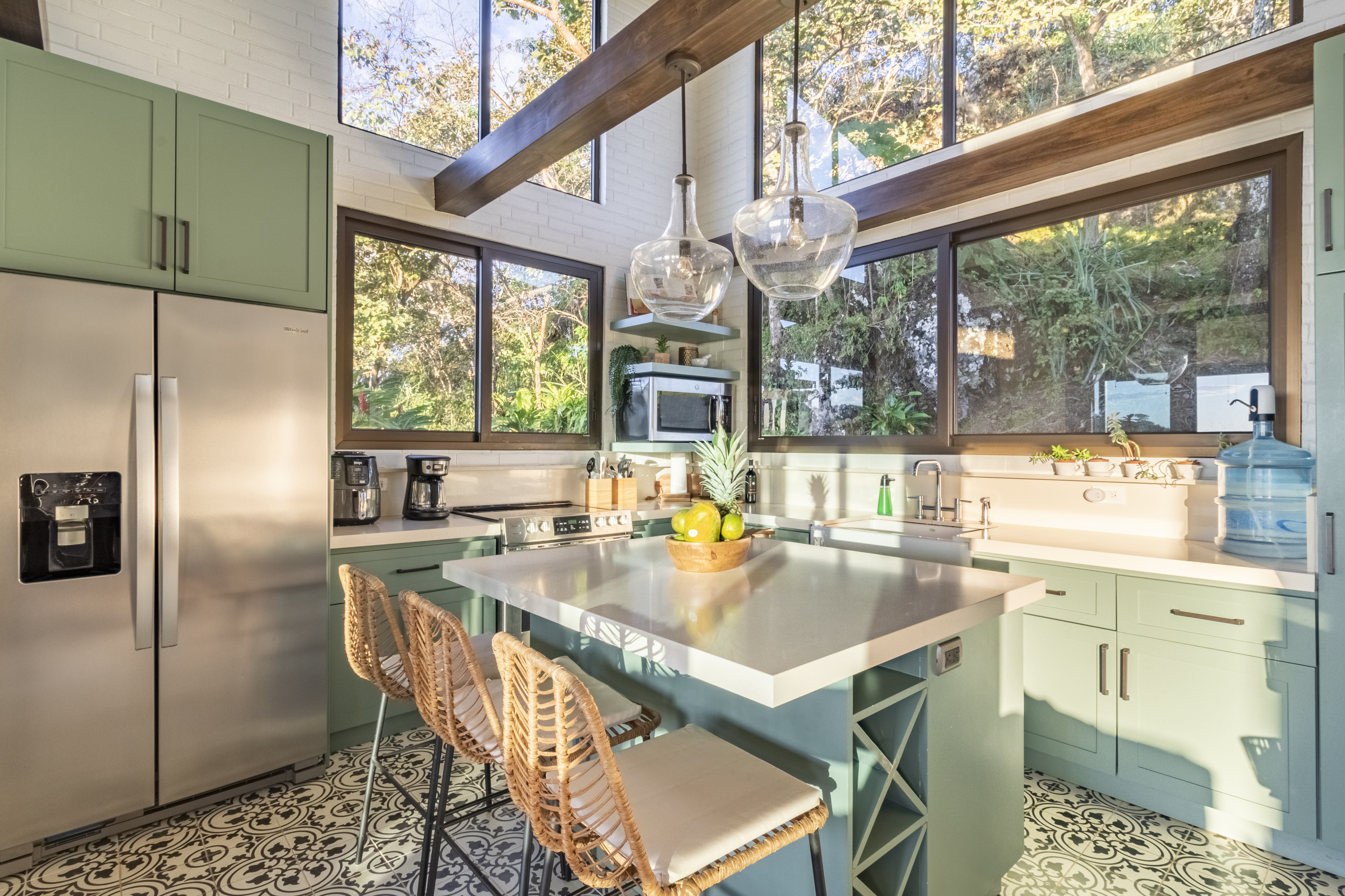Kitchen with green cabinets