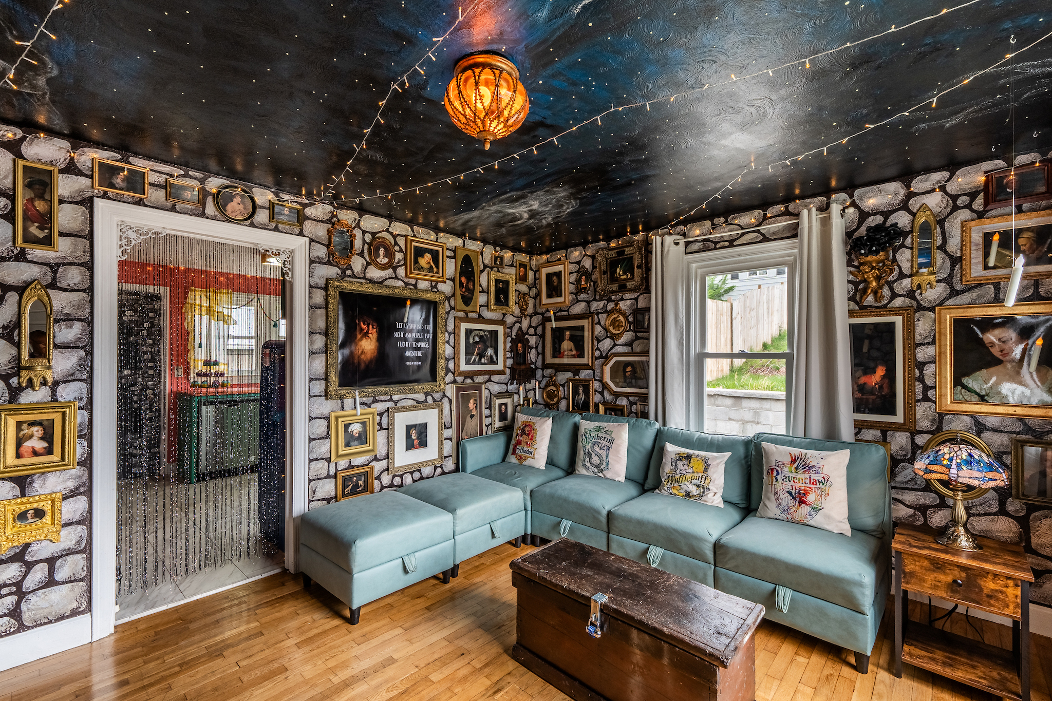 Living room with framed portraits on the walls