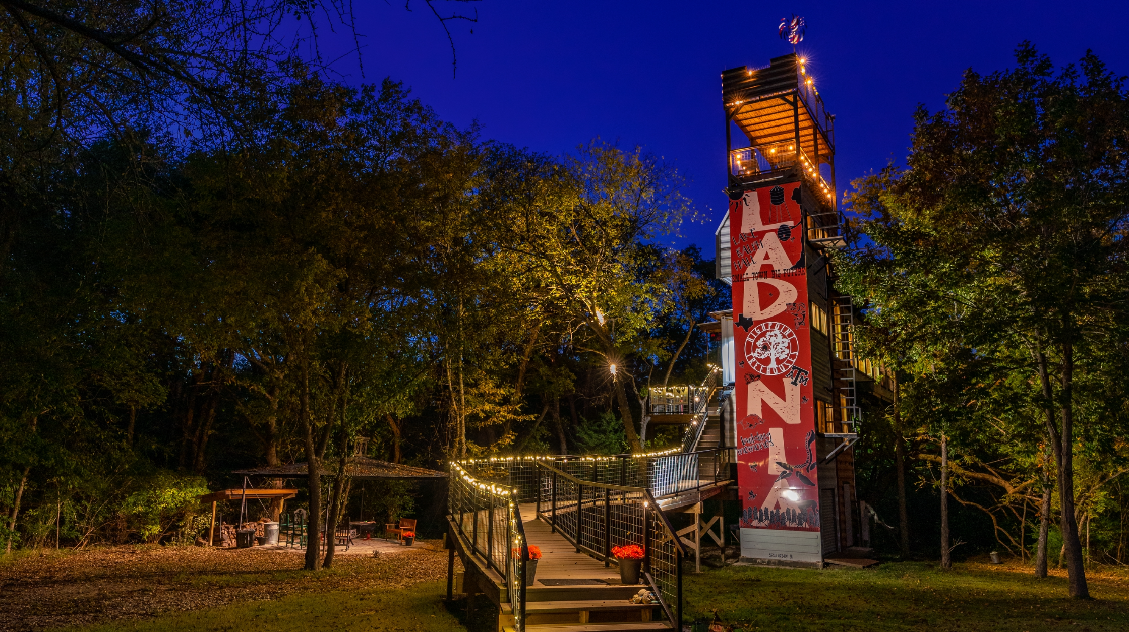 Red treehouse with multiple levels