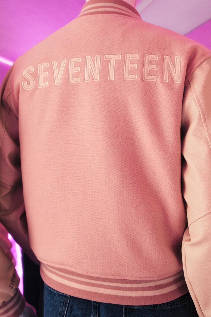 Pink varsity jacket with 'SEVENTEEN' written on the back.