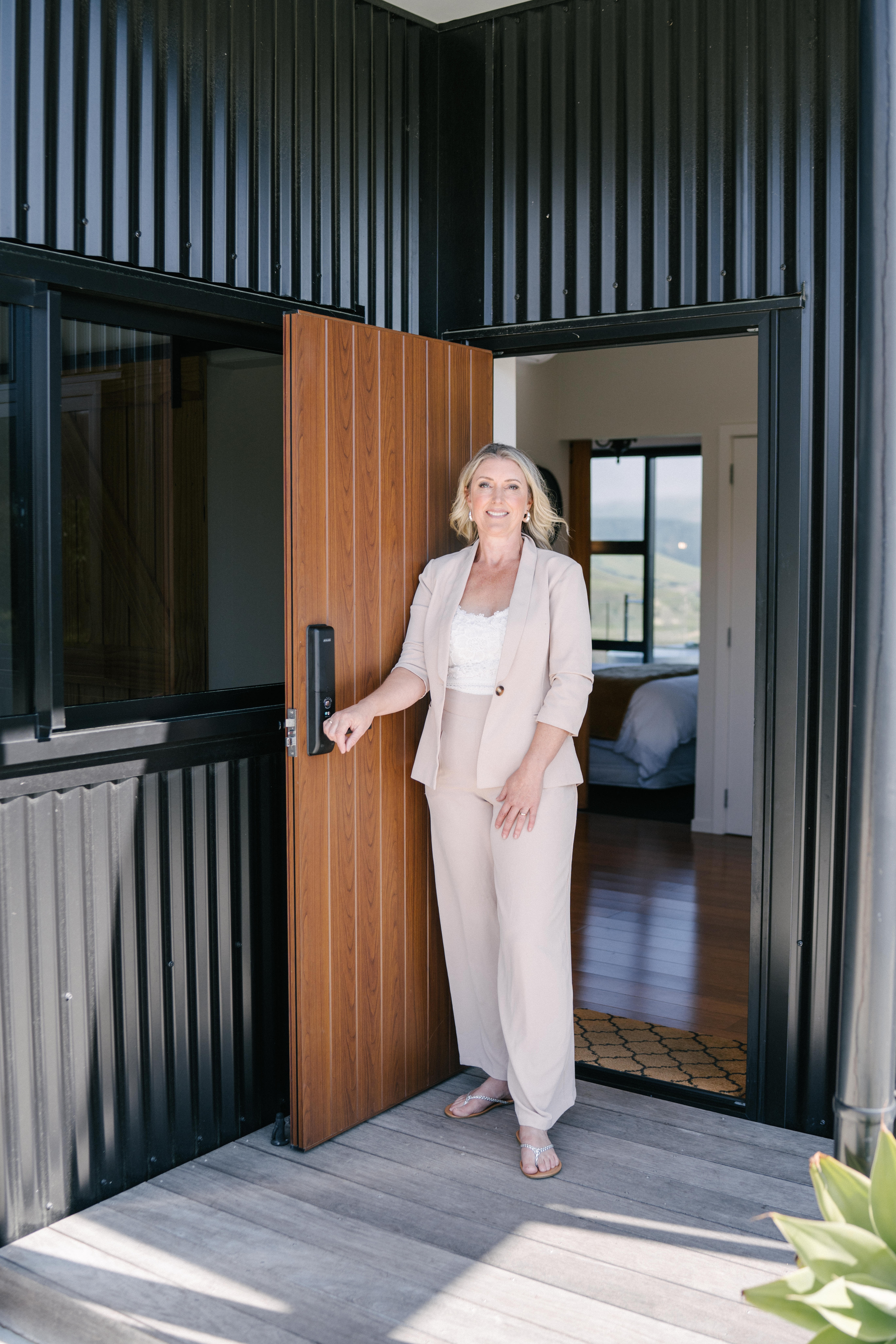 Host of the year out the front of her listing